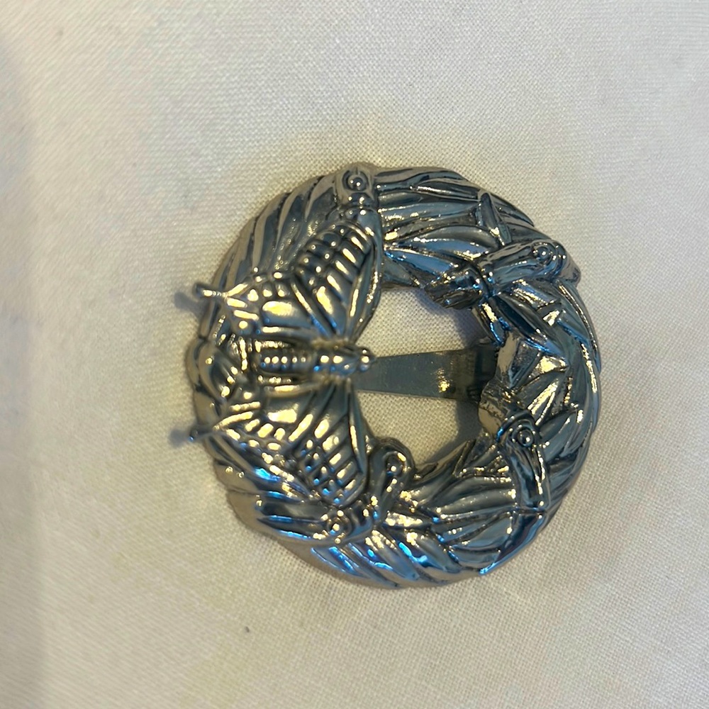 Silver round John Hardy butterfly scarf pin